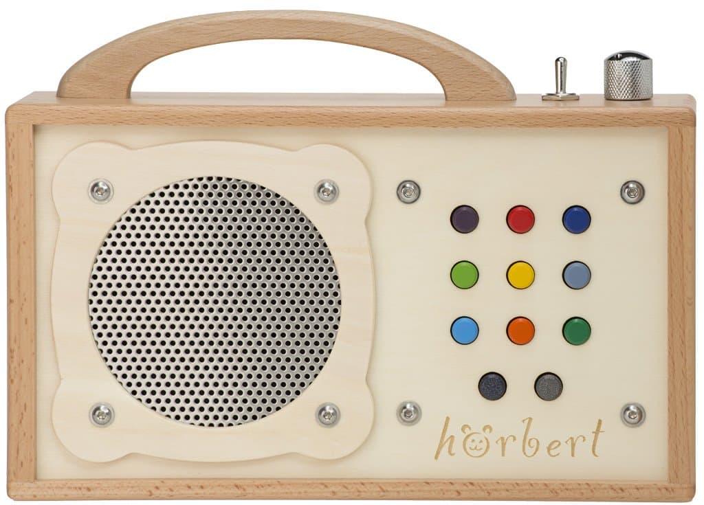 MP3 player for children: hörbert - made of wood and stainless steel. Portable with built-in speaker, volume limiter and SD card for 17h content on nine playlists. No headphones and no display.